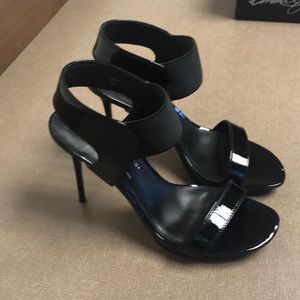 Donald J. Pliner black soft patent leather pumps